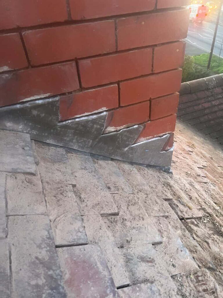 This is a photo of new leadwork being installed around an old chimney. Works carried out by TRP Roofing Woodmansey